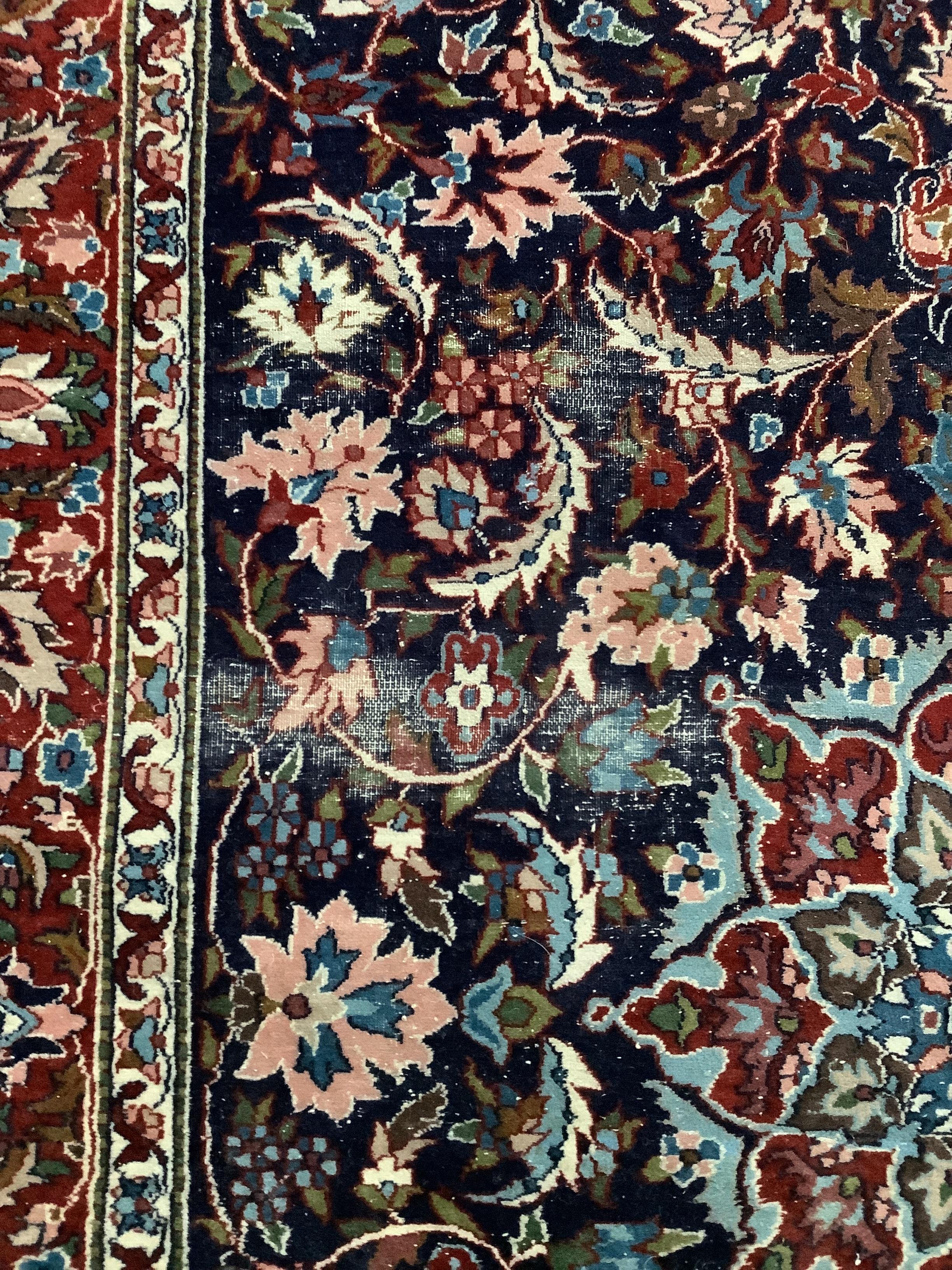 Two Tabriz blue ground rugs, larger 190 x 124cm